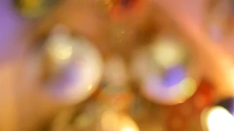 Blurred reflection of people walking on the background decorated Christmas tree. Stock Footage 69925118