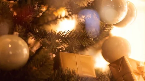 Blurred reflection of people walking on the background decorated Christmas tree. Stock Footage 69950840