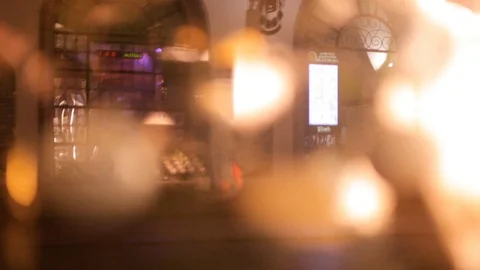 Blurred reflection of people walking on the background decorated Christmas tree. Stock Footage 69951107