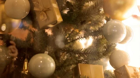 Blurred reflection of people walking on the background decorated Christmas tree. Stock Footage 69951399