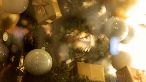 Blurred reflection of people walking on the background decorated Christmas tree. Stock Footage 69951450