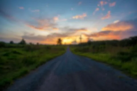 Blurred road to sunset Stock Photos