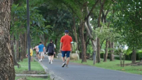 Blurred Runner Exercising in Public Park. Stock Footage 315753297
