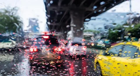 Blurred, Rush hour after work, Cars stuck and traffic jam in the rain at Rama 3 Stock Photos