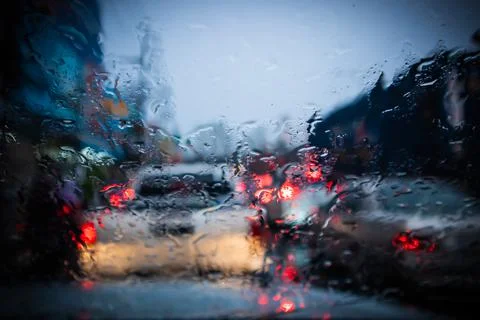 Blurred, Rush hour after work, Cars stuck and traffic jam in the rain Bangkok   库存照片
