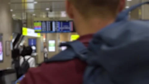 Blurred Rush Hour Crowd of Japanese Commuters and Salarymen at Busy Station Stock Footage 264985622