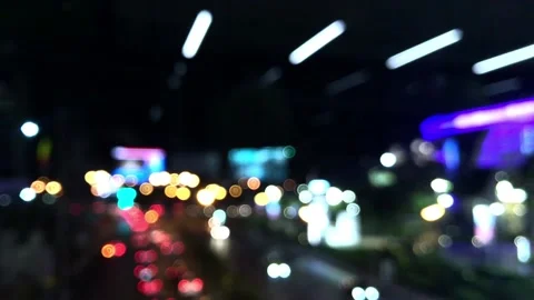 Blurred scene of traffic at an intersection in the night time Stock Footage 120503015