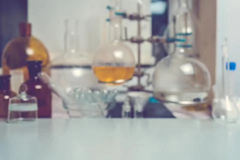 Blurred science background, test tubes and desktop, research concept Stock Photos