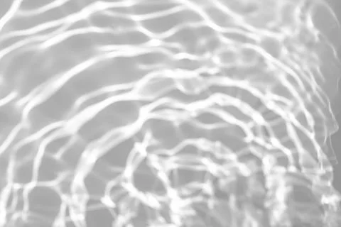 Blurred shadow and light caustic effect on a white wall 스톡 일러스트