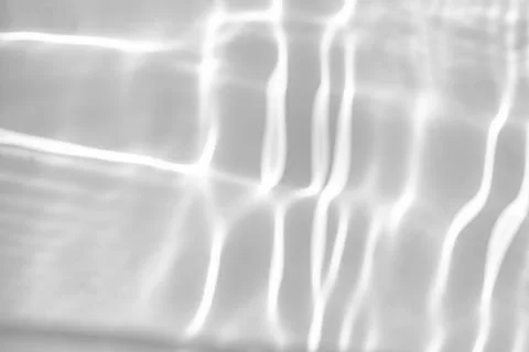 Blurred shadow and light caustic effect on a white wall Stock Illustration