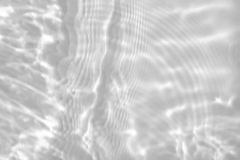 Blurred shadow and light caustic effect on a white wall Illustrazione stock