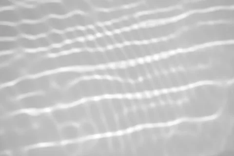 Blurred shadow and light caustic effect on a white wall 스톡 일러스트