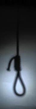 Blurred shadow of the loop of the gallows on the light wall, darkness, reduce Stock Photos