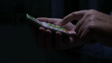 Blurred Shooting with a Man Calculating with an Adding Machine. Stock Footage 233286029
