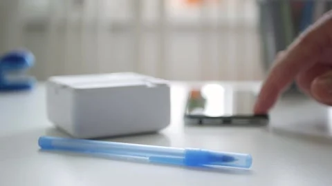 Blurred Shooting with a Mini Printer Printing a Document Using Internet. Stock Footage 285303116