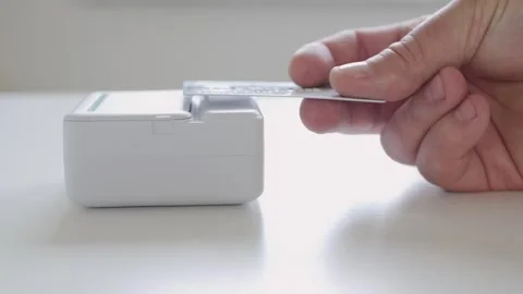 Blurred Shooting with a Mini Printer Printing a Document. Modern Technology. Stock Footage 305400941