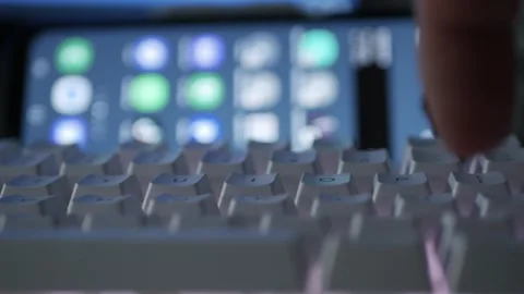 Blurred Shooting with a Person Working Night, Typing on Keyboard, Using Internet Stock Footage 336916989