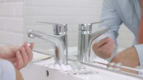 Blurred Shooting with a Sick and Suffering Man in Front of the Bathroom Mirror Stock Footage 336916984