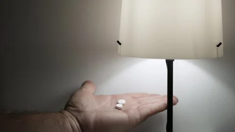 Blurred Shooting with a Suffering Person Taking Medical Pills. Suffering Elderly Stock Footage 340036406