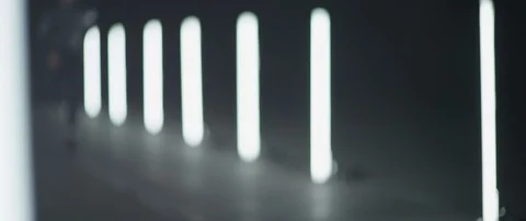 Blurred shot person running between led stick lights in slow motion, Japan Stock Footage 124662046
