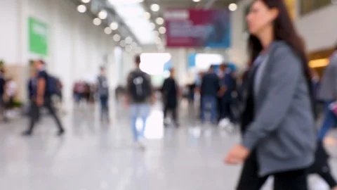 Blurred shot of rush hour at trade fair with many visitors Stock Footage 116026339