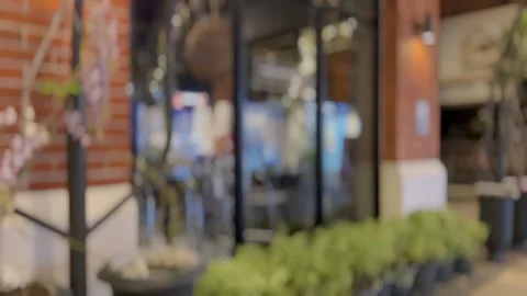 Blurred shot of storefront along the sidewalks of the night bazzar. Stock Footage 270153946