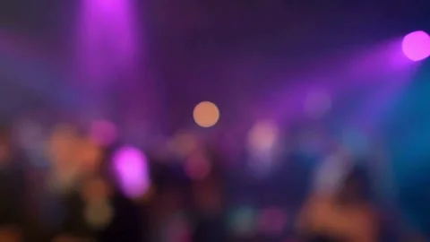 Blurred silhouettes of Crowd making party at a rock concert. dancing party cl Stock Footage 265763500