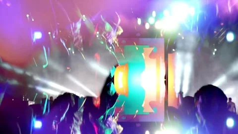 Blurred silhouettes of Crowd making party at a rock concert. dancing party cl Stock Footage 265764302