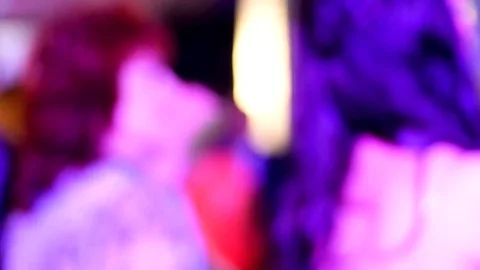 Blurred silhouettes of people dancing in a disco Stock Footage 76247380