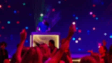 Blurred silhouettes of people dancing at a disco. Stock Footage 327773401