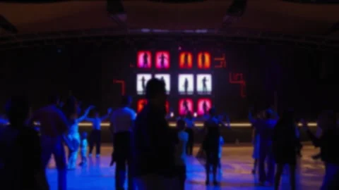 Blurred silhouettes of people dancing at a disco. Stock Footage 327773476