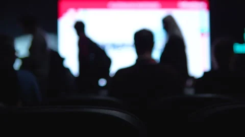 Blurred Silhouettes Of People At A Tech Conference Startup Event Stock Footage 338009341