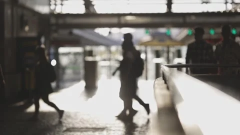 Blurred silhouettes of people walking at the exit of the station Stock Footage 255041177