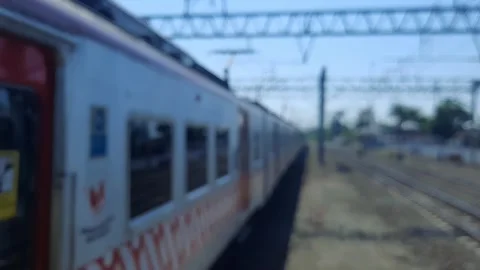 Blurred of silver electric railway train cars under metal Stock-Footage 340569180