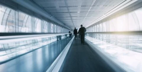 Blurred skywalk with Commuters Stock Photos