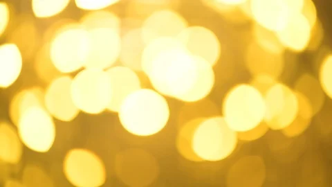 Blurred small metal bokeh background. Glittering golden light dots Stock Footage 120996005