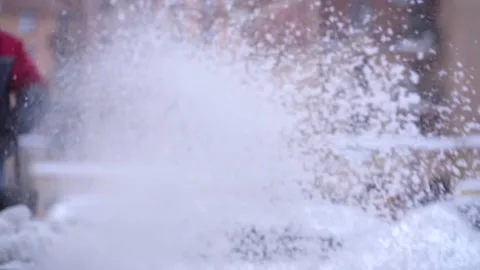 Blurred Snow blower in action clearing a residential driveway after snow storm Stock Footage 170061230