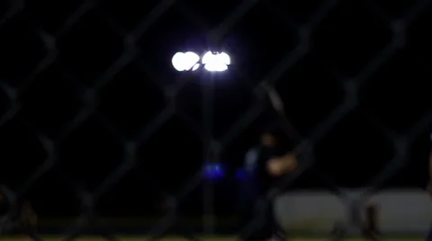 Blurred softball player swinging the bat 스톡 동영상 33450127