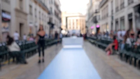 Blurred static shot of a blue carpet set on a large street Stock Footage 116637590