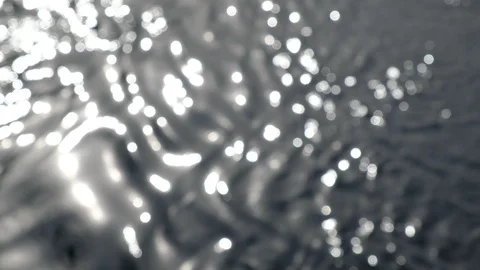 Blurred sun glare on the river or lake water. Rapid river flow. Stock Footage 128627326