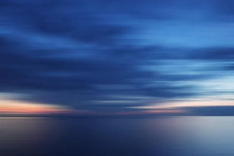Blurred sunset in blue Stock Photos