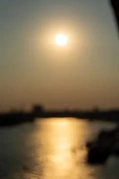 Blurred sunset over a river Stock Photos