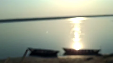 Blurred Sunset Reflection With Boats On River Vídeo Stock 334834569