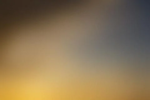 Blurred sunset sky abstract background with warm golden orange and cool gray 스톡 일러스트