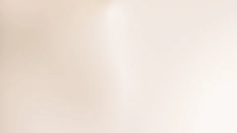 Blurred tan white surface ideal for background video Stock Footage 329010555