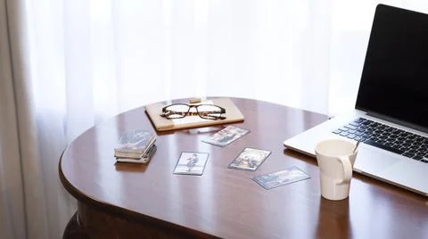 Blurred tarot cards on the table, esoteric concept, fortune telling predictio Stock Photos