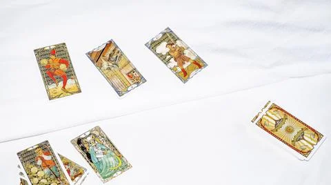 Blurred tarot cards on the table, esoteric concept, fortune telling predictio Foto stock