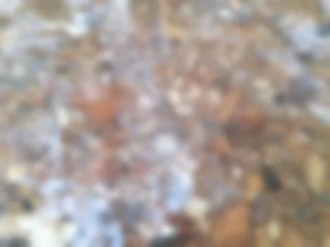 Blurred texture of the rock wall background is natural on background. Stock Photos