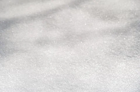 Blurred texture of snow in winter close-up Stock Photos