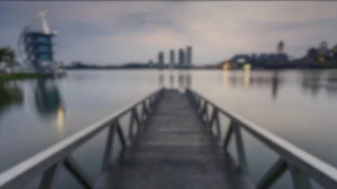 Blurred Time lapse scenery of sun rising at Pullman jetty, Putrajaya. Zooming in Video stock 83015860